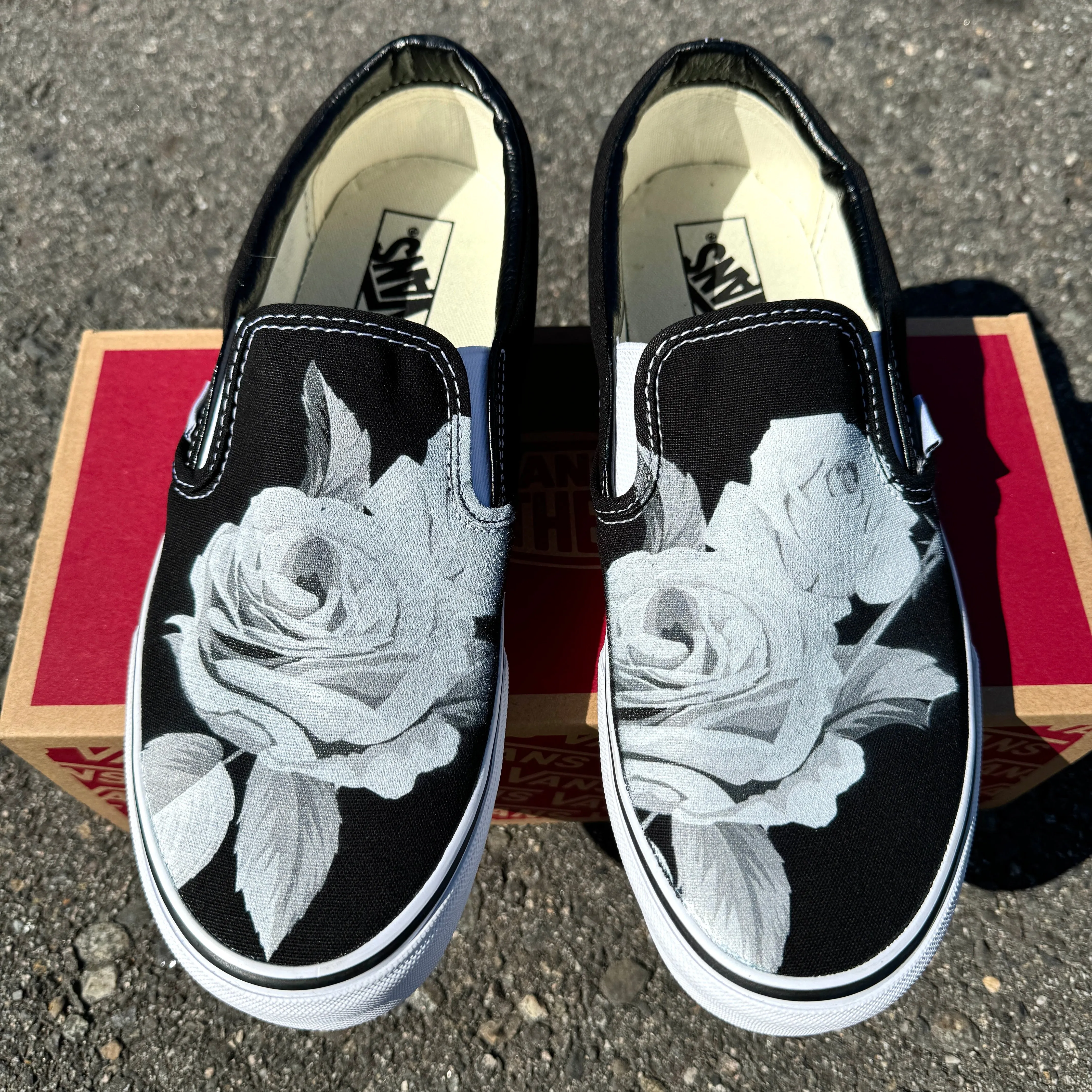 Black and White Rose on Custom Black Slip On Vans Shoes for Women and Men