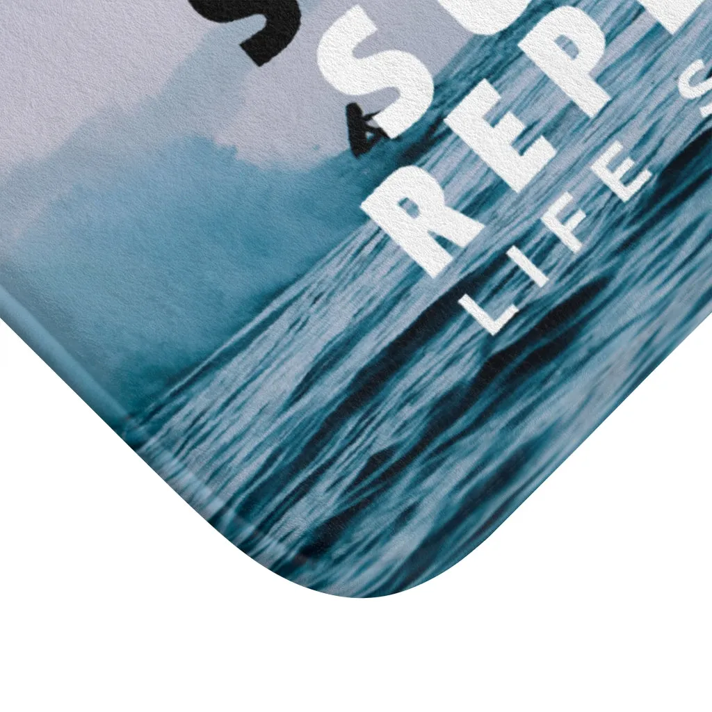 Eat, Sleep, Surf and Repeat Bath Mat