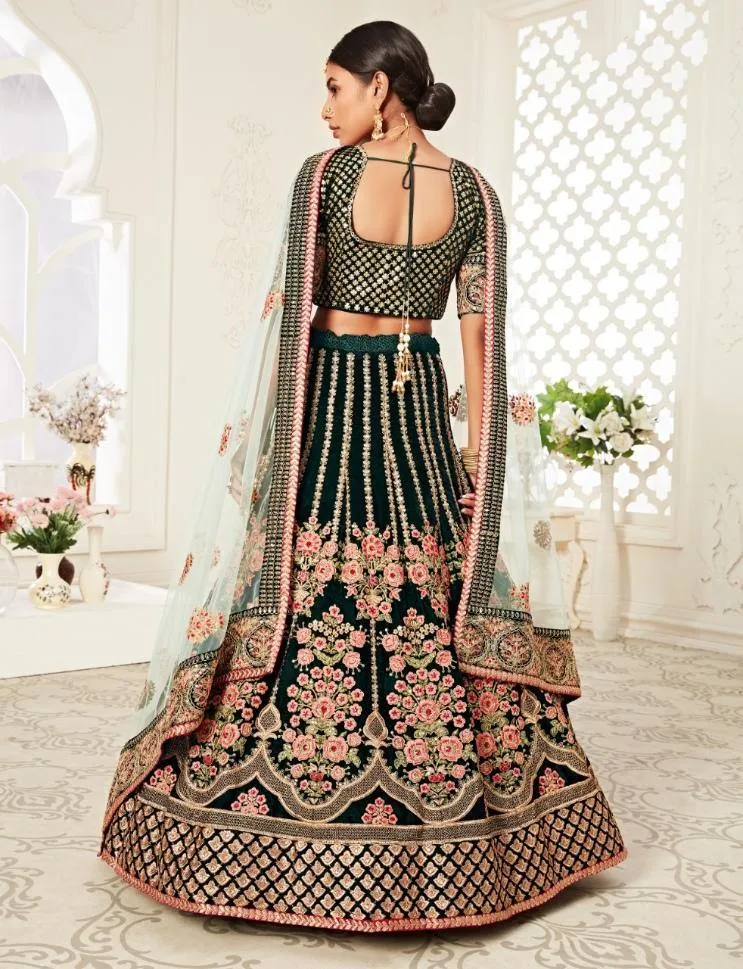 Green Heavy Bridal Wear Lehenga Choli - Rent