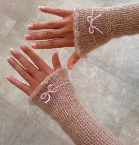 Handmade knitted mohair hand warmers in beige with dusky pink bow