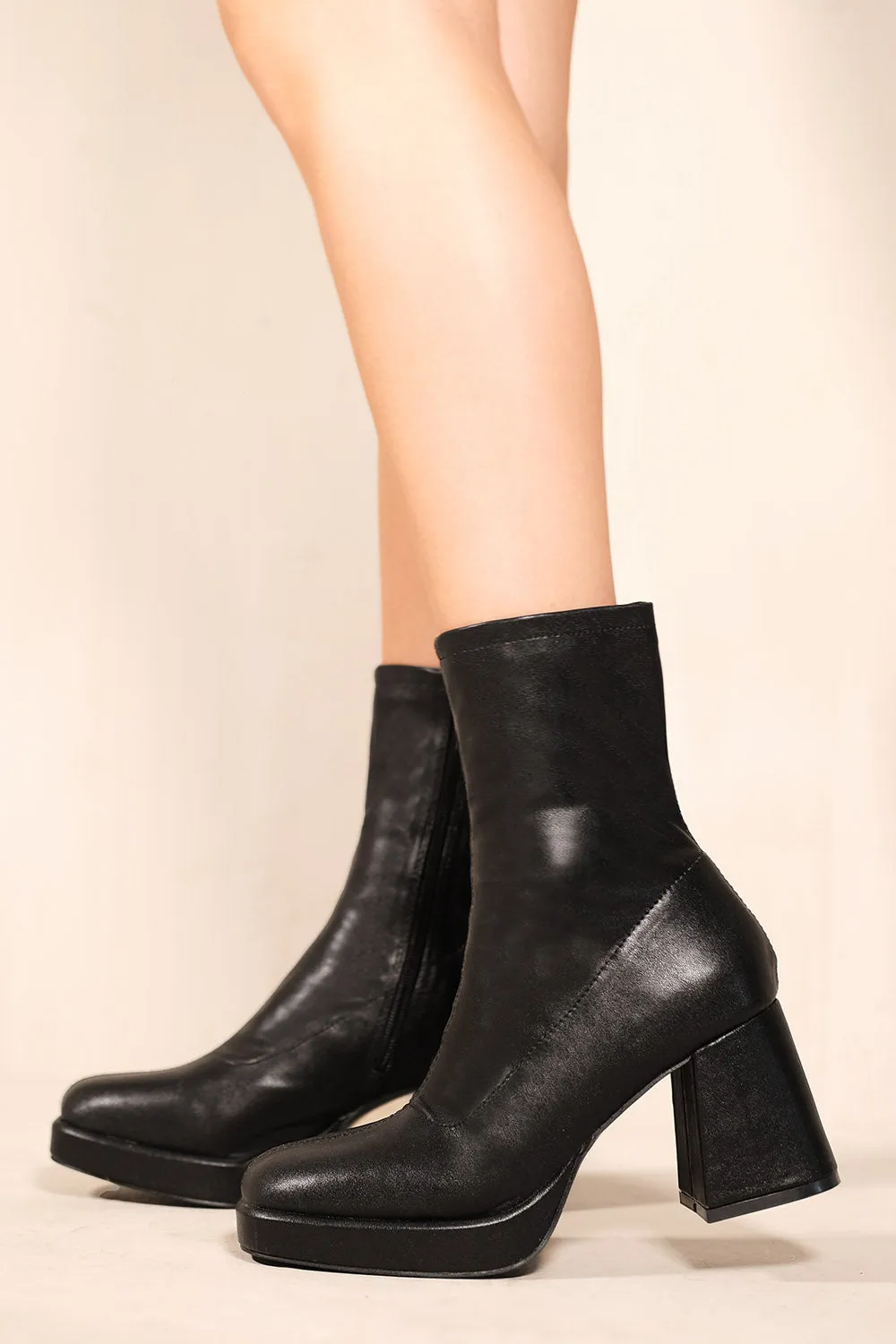 LAURIE MID FLARE BLOCK HEEL ANKLE BOOTS IN BLACK FAUX LEATHER